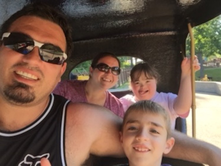 family of four in a car