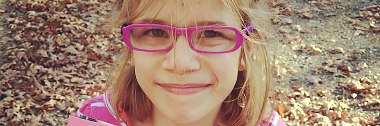 How Finding My Daughter’s Sister is Helping Her Overcome Dyslexia M with letters from her sister.