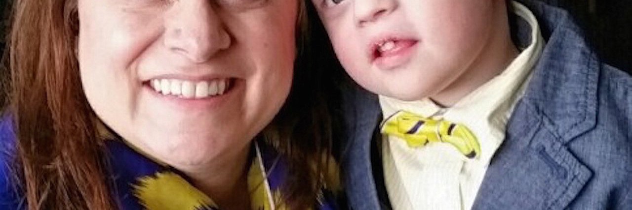 A Letter to Alex Jones, From a Mother of a Son With Down Syndrome Julie Gerhart-Rothholz and her son, Evan