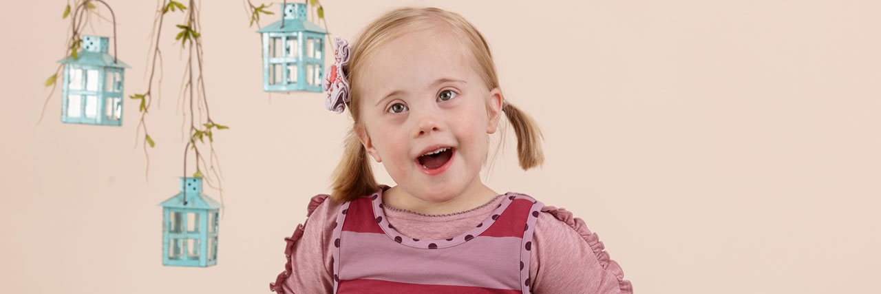 Matilda Jane Clothing Uses Disabled Models for Back-to-School Line Matilda Jane Clothing model, young girl with pigtails