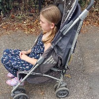 Rachel's daughter in a stroller