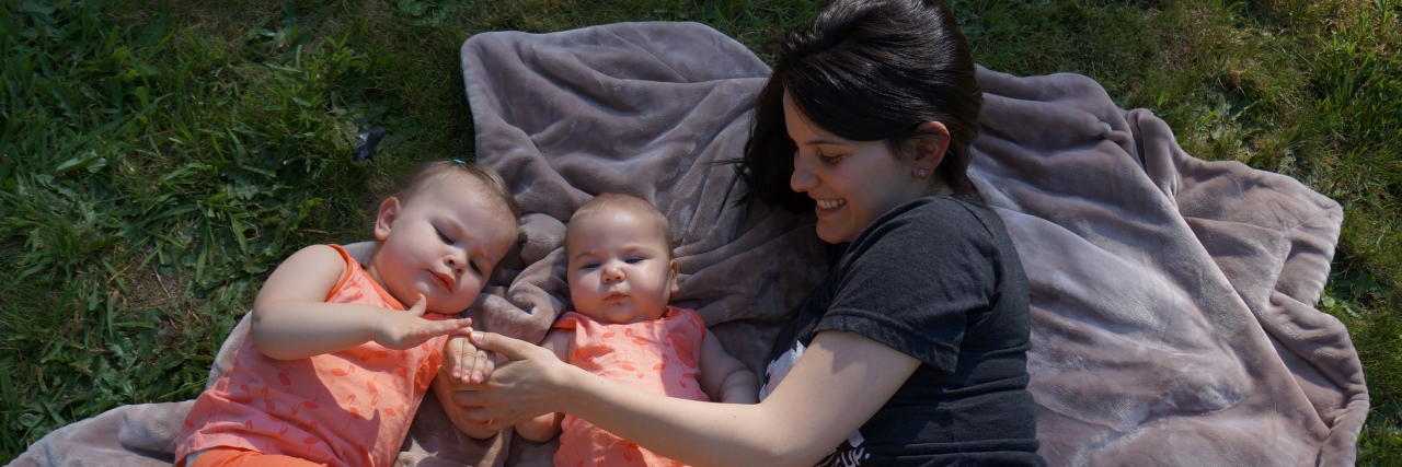Answering 'I Don't Know How You Do It' With a Terminally Ill Child Stephanie with her two daughters outside.