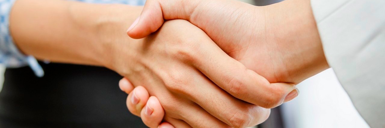 Arthritis: Why I Sometimes Can’t Shake Hands two women shaking hands