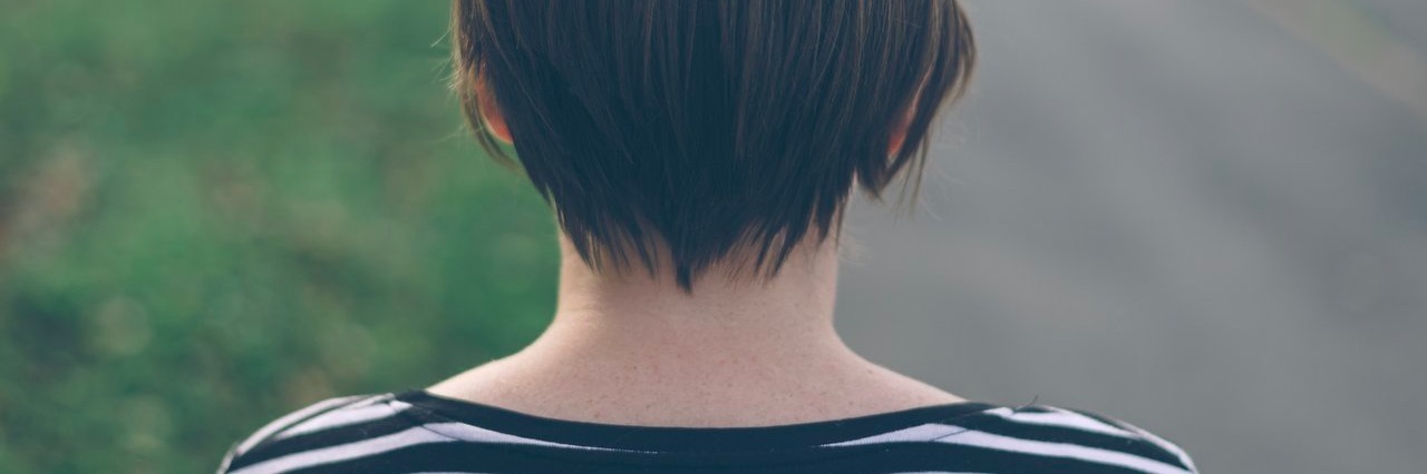 Hypothyroidism: Please Don’t Belittle My Disease woman walking down the street