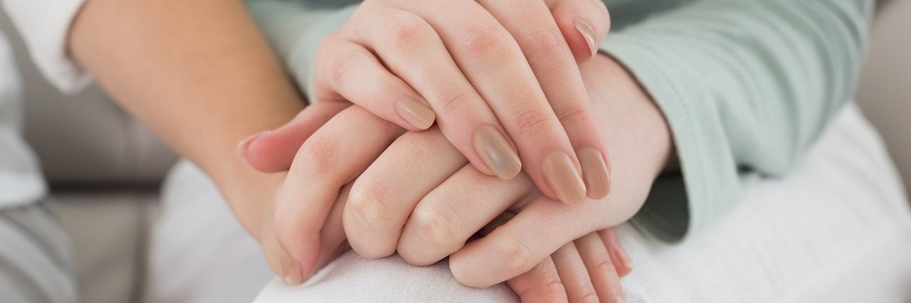 What I Want Women Who Have Had a Miscarriage to Know friends holding hands