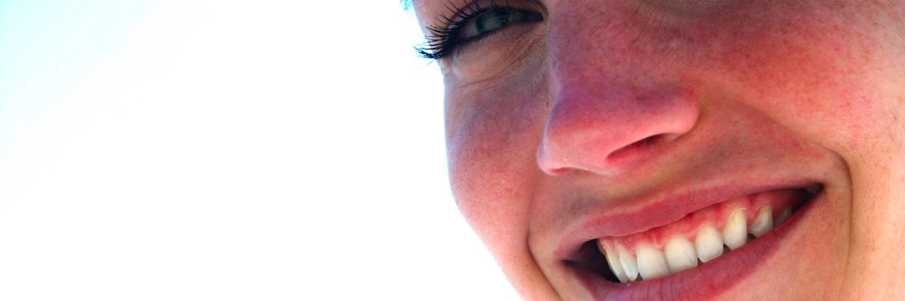 Encouraging Someone With Depression: 'I’m Not Disappointed in You' woman smiling