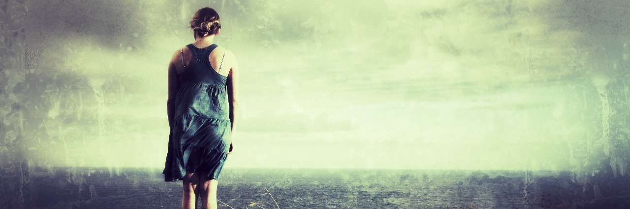 What to Know: Living With an Orphan Disease Abetalipoproteinemia Lonely woman looking at ocean vista over textured grunge background.