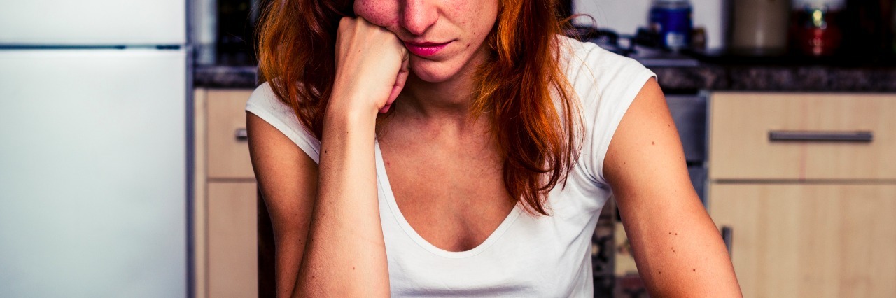 Answering 'How Are You?' When You Have an Eating Disorder woman looking down at cereal