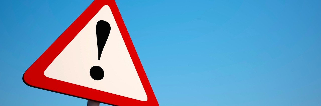 Suicide Loss Survivor Argues We Need Trigger Warnings sign with an exclamation point