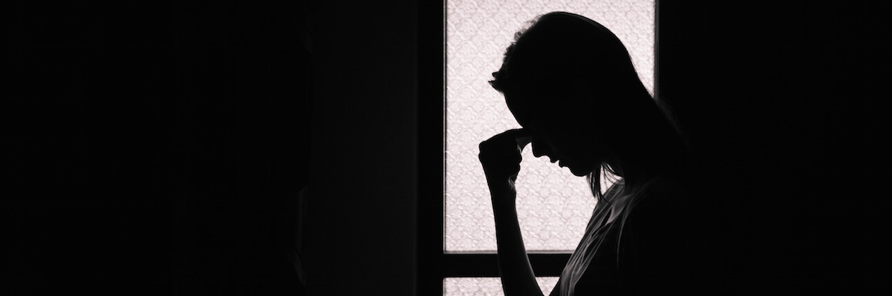 When the Medication for Depression Stops Working woman in a dark room