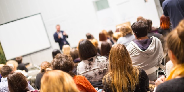 A Millennial's Guide to College With a Neurological Disability Students in the lecture hall.