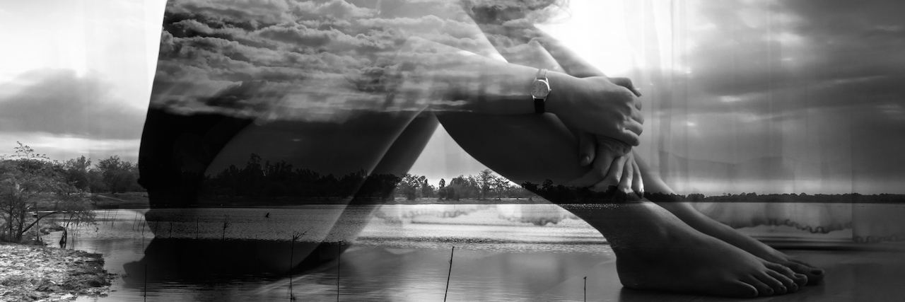 What It's Like to Have a Psychotic Break With Anosognosia young woman with her head down