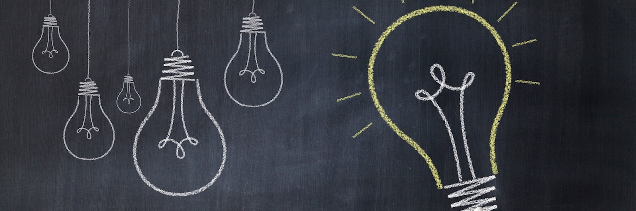 How 'Motivational Messages' Don't Help People With Mental Illness Hand drawing big light bulb on blackboard