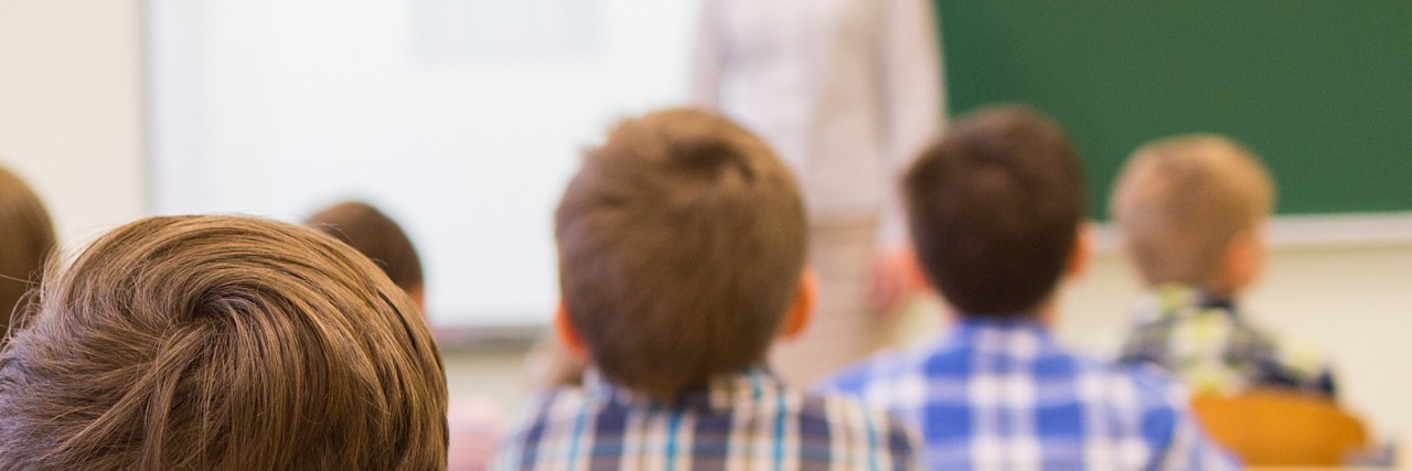 Best and Worst Things I’ve Heard From Special Educators as a Parent Group of school kids and teacher in classroom.