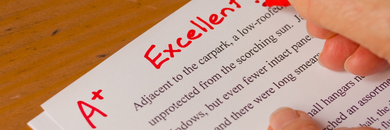 To the Teacher Who Helped Me as a Child With Learning Disabilities Teacher giving an A grade.