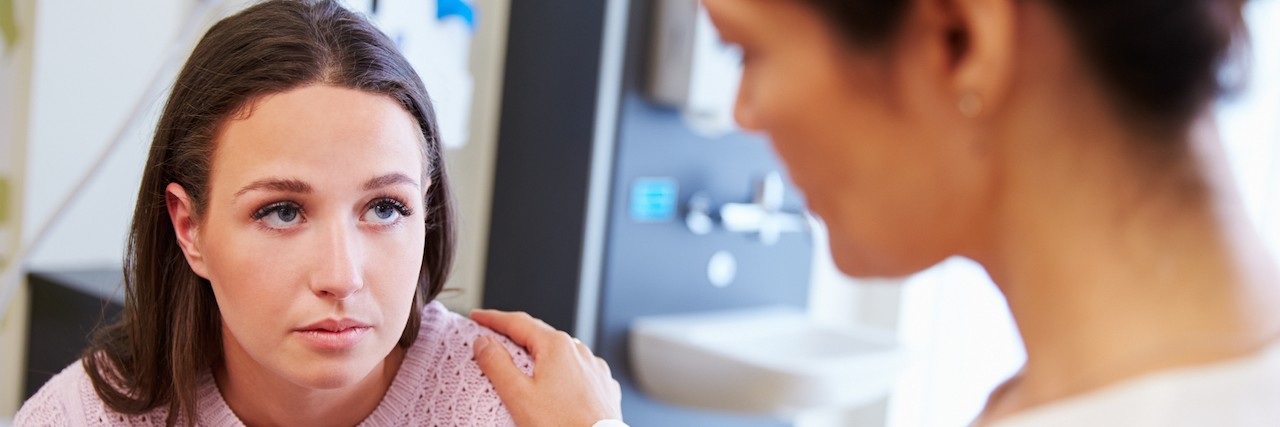 Mental Illness: My Response to 'I May Never Feel Happiness' woman at the doctor's office