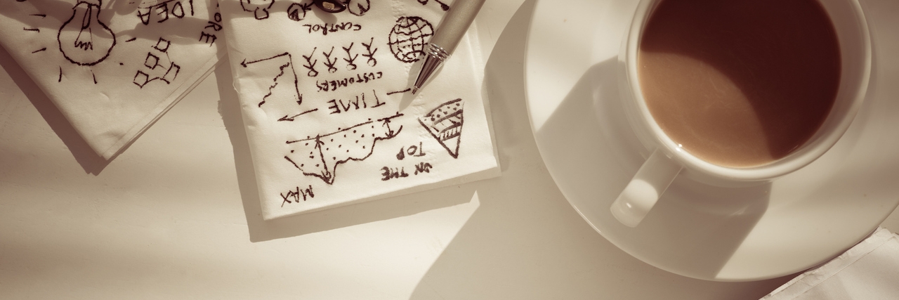 High-Functioning Depression: Hiding Depression With Busyness coffee and a newspaper