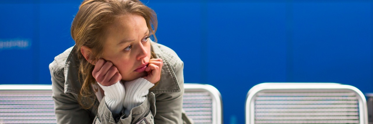 Why I Can't Work With Bipolar Disorder young woman sitting in a chair