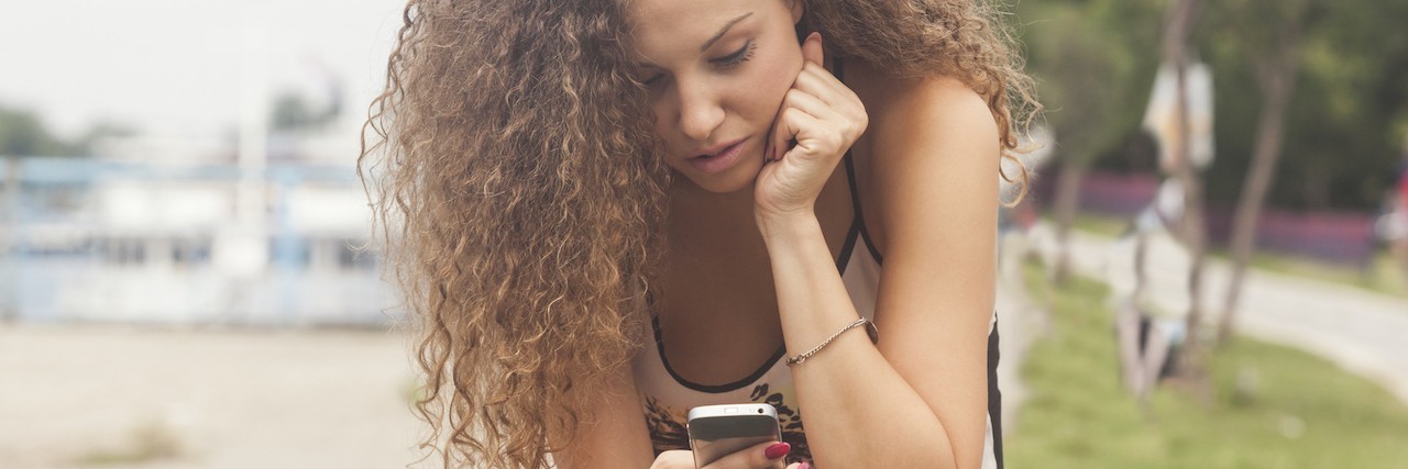 Responding to Friends Who Don't Understand Your Health Limits Teenage girl texting on the phone