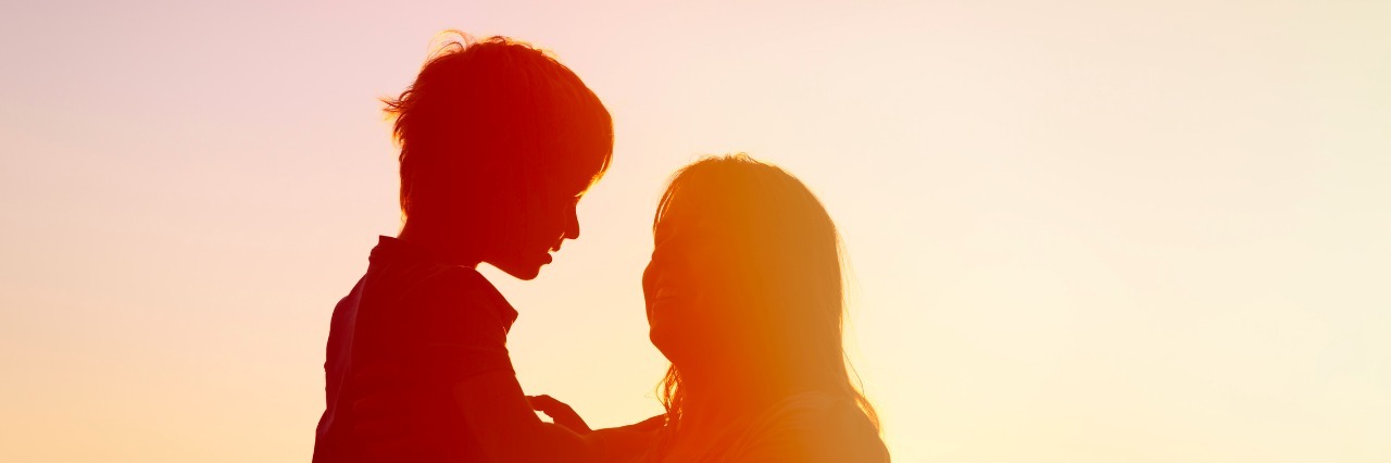What to Expect After Your Child's Tracheostomy happy mother and son at sunset sunlight