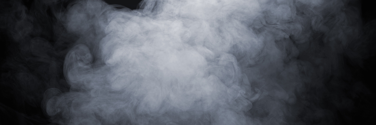 How Air Quality Can Cause Breathing Problems for People With Asthma Smoke isolated on black background