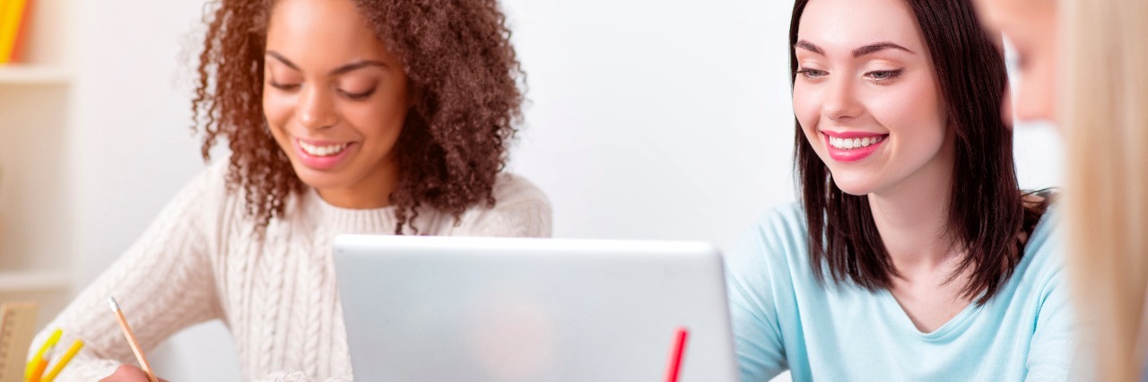 A Letter to Professors From a Chronically Ill Student Involved in process. Cheerful and beautiful students studying in the class and doing their homework