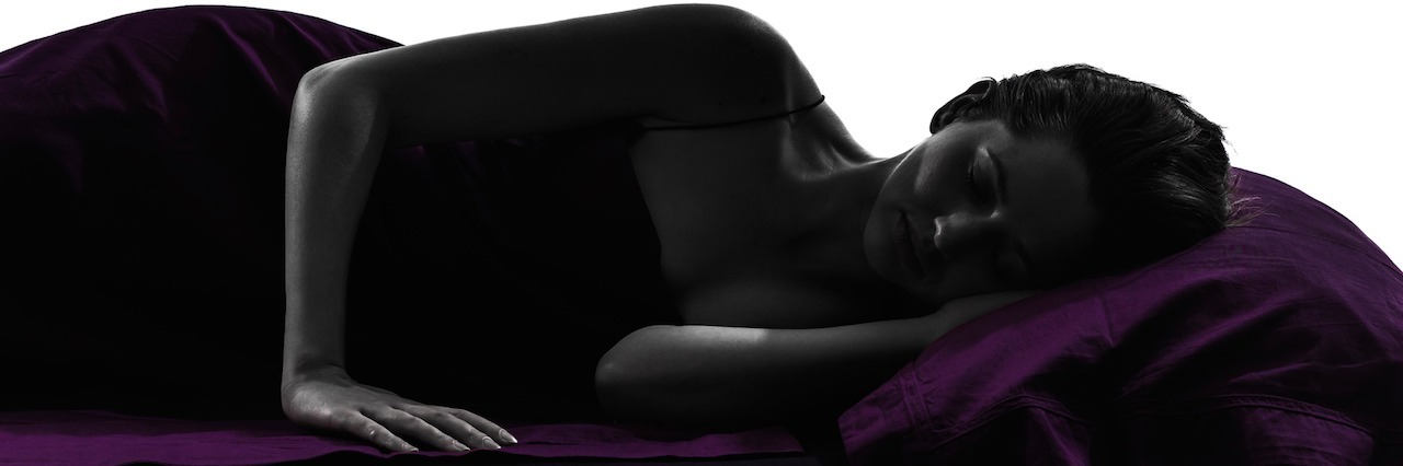 What Rheumatoid Arthritis Feels Like for One Hour one woman in bed sleeping lying on back silhouette studio on white background