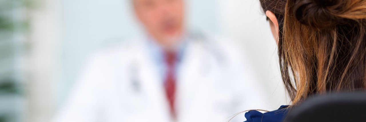 Letter to Doctors Who Label Patients as 'Non-Compliant' Doctor talking to a patient in his office