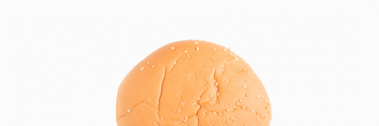 Ordering 'Just the Bun' at McDonald's for My Son With Autism Hamburger bun isolated on white background.