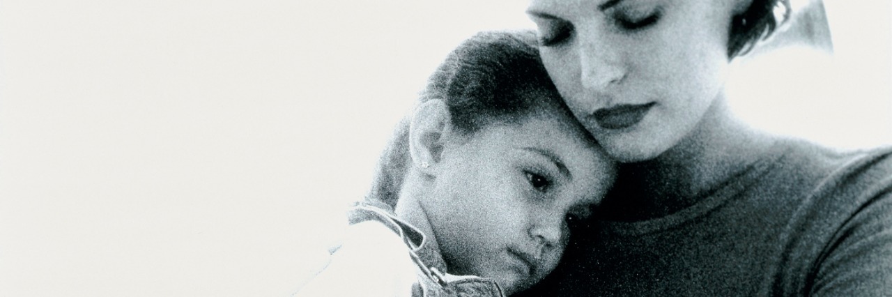 Life as a Child Therapist and Mom to Anxious Kids Mother hugging her daughter