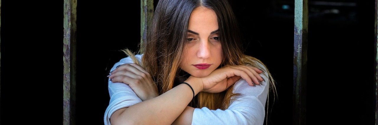 When My Anxiety Makes Me Think Negatively An unhappy woman sitting