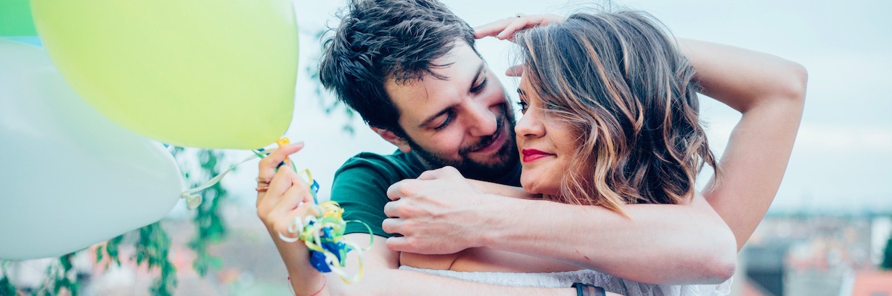 What You Should Know If Your Partner Has Anxiety couple holding a balloon