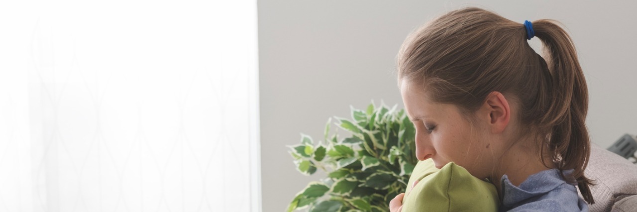 Fighting Depression for My Children woman on a couch