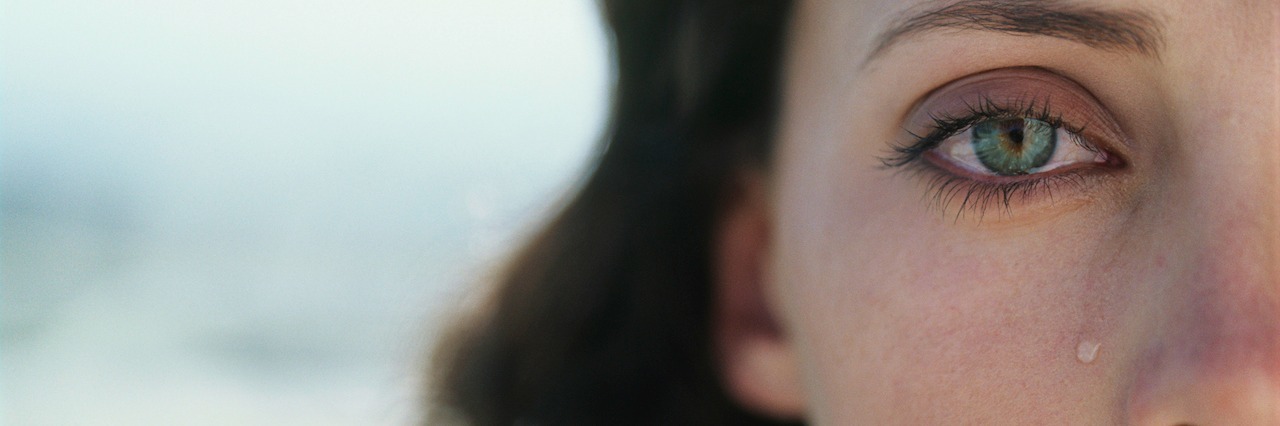 Learning It's OK to Cry in My Journey With Depression young woman crying