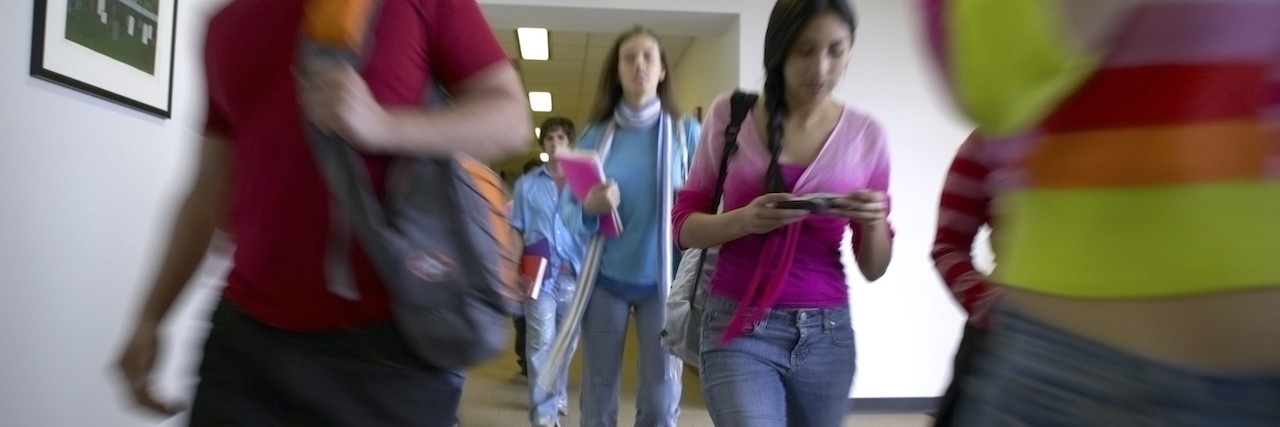 Students walking in a hallway
