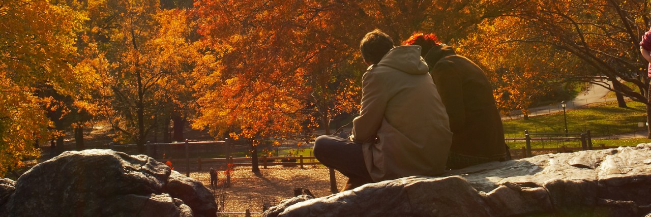 To the Person Who Is Afraid to Get Help for Mental Health Issues People sitting on a rock in Central Park, New York City, in the fall