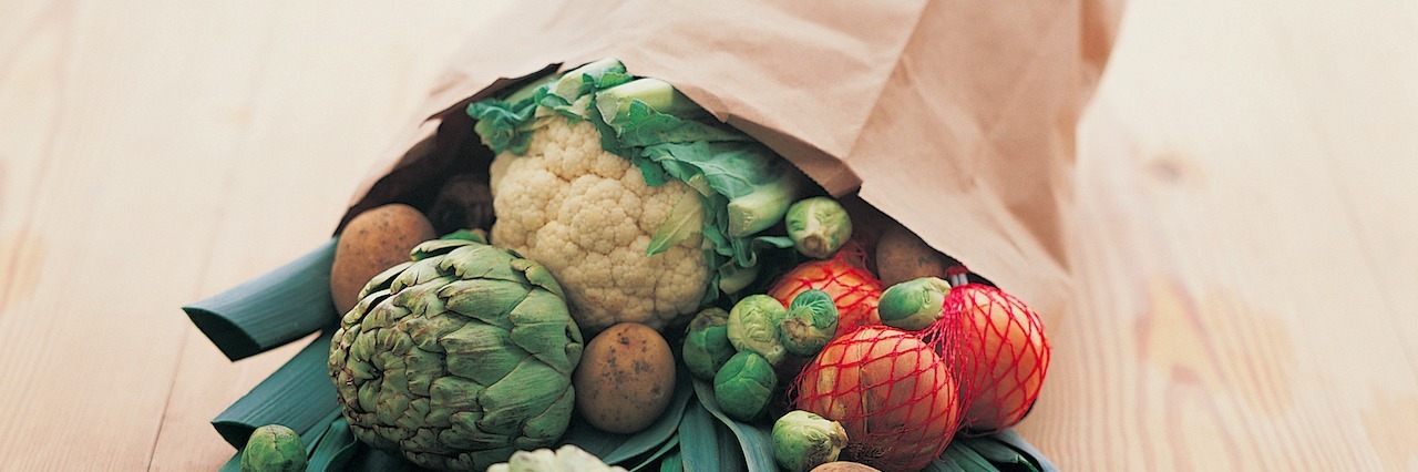 4 Habits People With Binge Eating Disorder Need to Break paper ball full of vegetables that was dropped on the ground