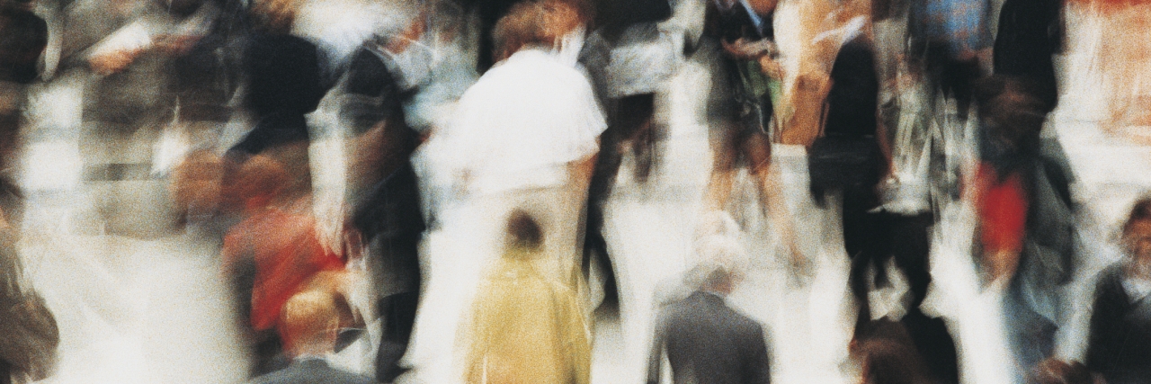 Derealization and Depersonalization: Mental Symptoms of Panic Attacks crowded street