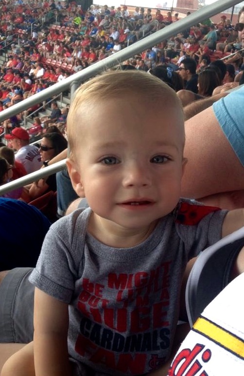 A young boy at a baseball game