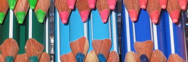 Color pencils stacked neatly on top of each other
