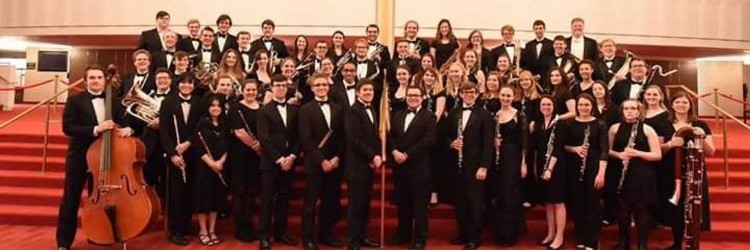 group photo of symphonic band at concert