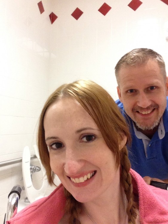 man and woman in the target family restroom