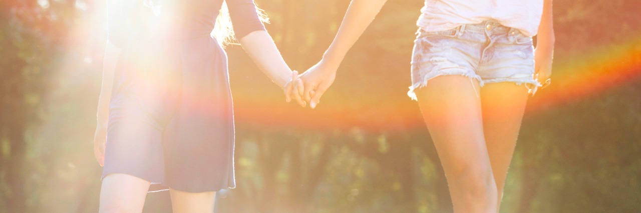 The Woman Who Loves Me With Ehlers-Danlos Syndrome two women holding hands and walking in park