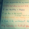 positive affirmations written on notebook