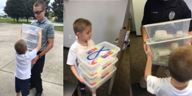 Stephanie Cooper's son with ALERT autism boxes
