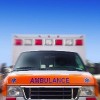 Front view of an ambulance in motion