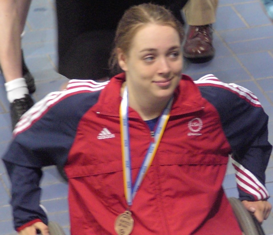 Beth wearing one of her medals.