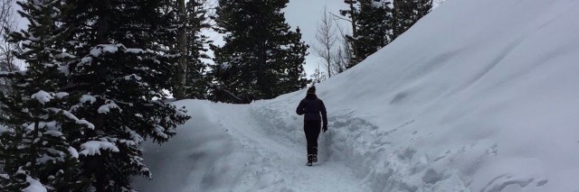 woman hiking in the Rockies