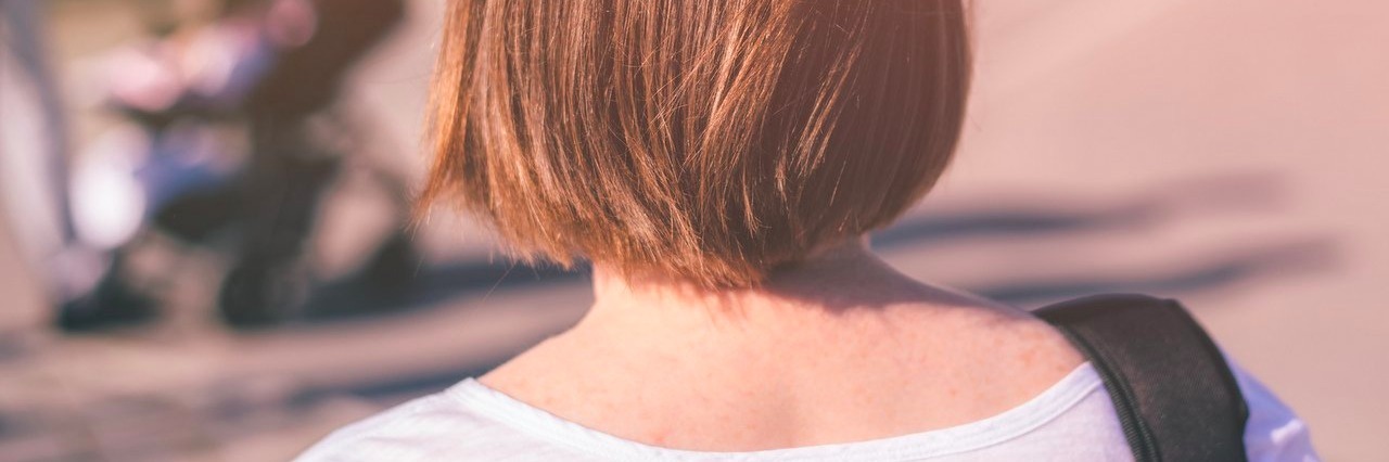 Trying to ‘Fit In’ as a Person on the Autism Spectrum young woman walking on city streets