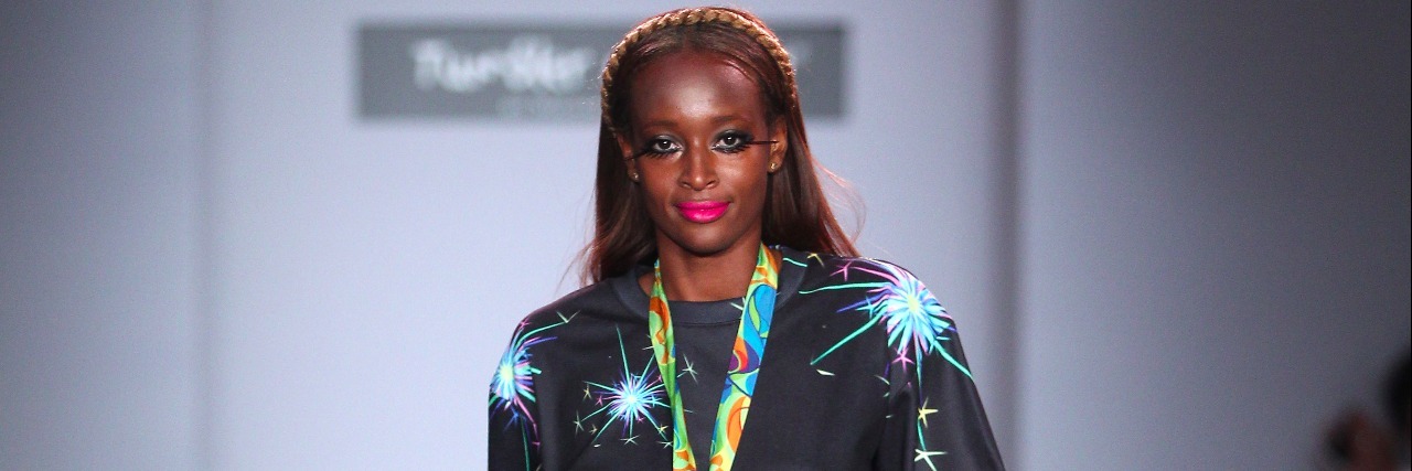 Michael Kuluva Designs Activewear Line Inspired by Arthritis Model wearing "Creaky & Tipsy" activewear